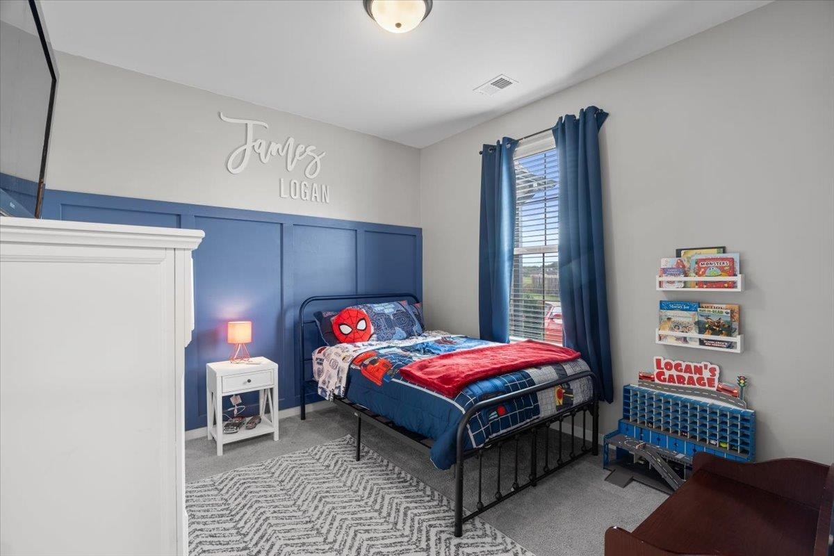 270 Whispering Ridge Drive Oakland, TN 38060 - Photo 14 of 27 a bedroom with a bed and a window