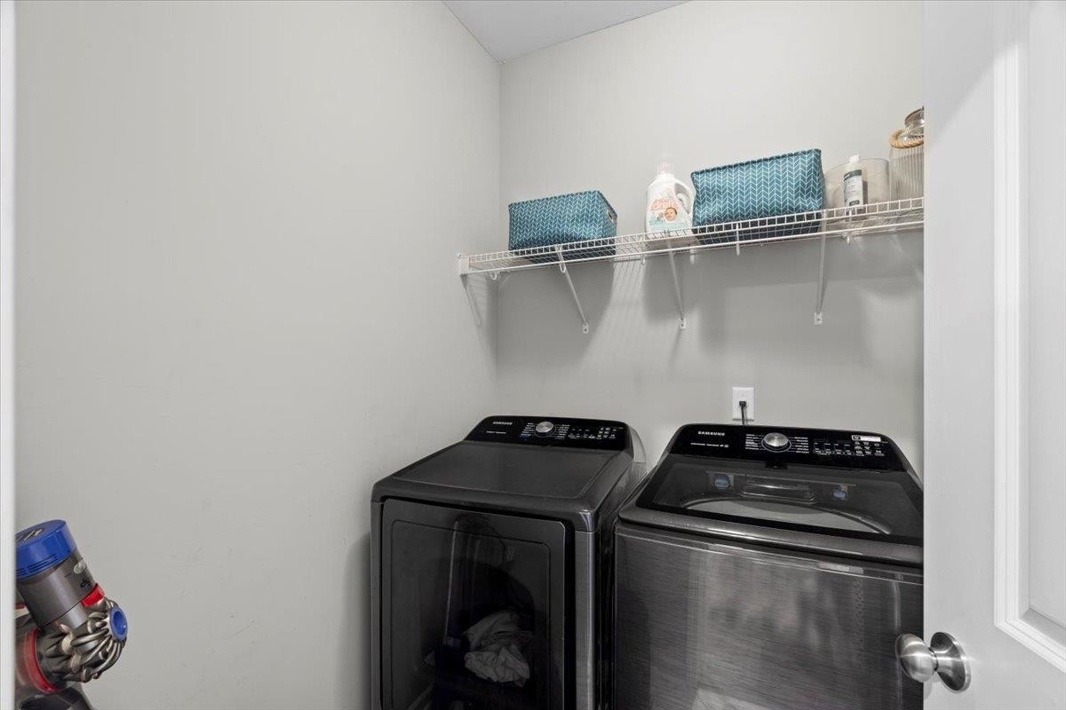 270 Whispering Ridge Drive Oakland, TN 38060 - Photo 19 of 27 a view of storage and utility room with racks on the wall