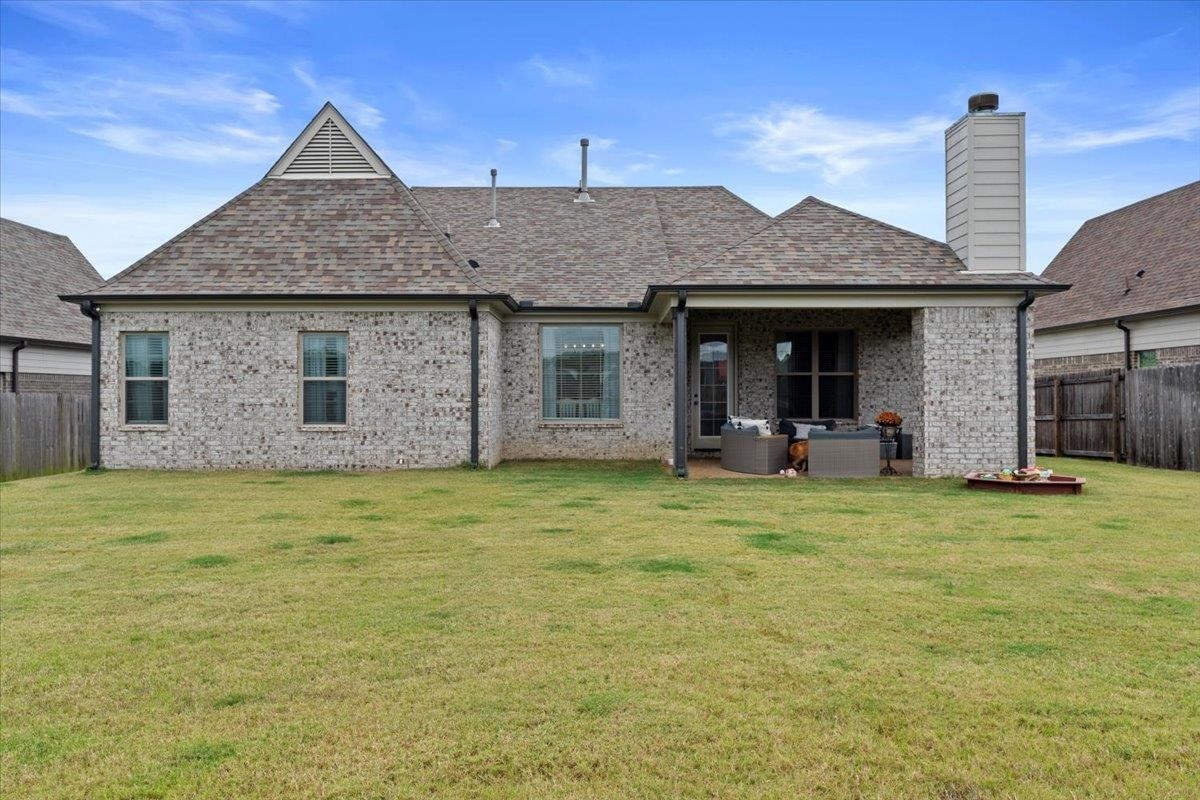 270 Whispering Ridge Drive Oakland, TN 38060 - Photo 2 of 27 a front view of a house with a garden