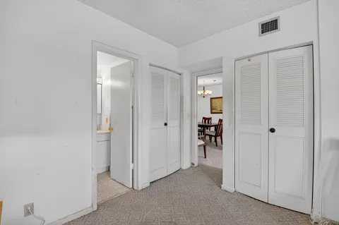 a view of a livingroom with a hallway