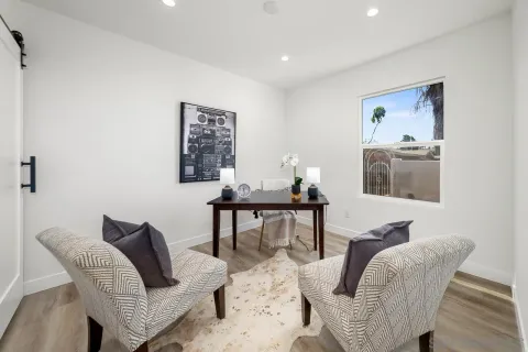 a workspace with furniture and window