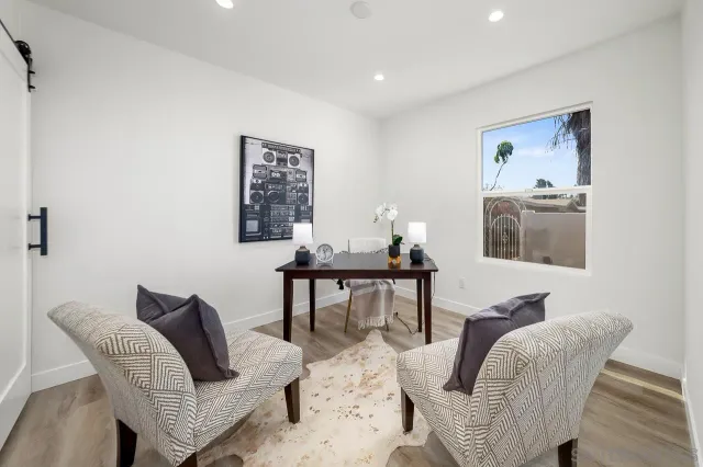 a workspace with furniture and window