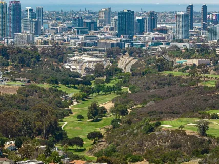 an aerial view of residential building and city view