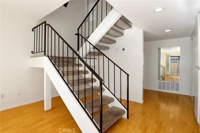 a kitchen with stainless steel appliances granite countertop a stove and a sink