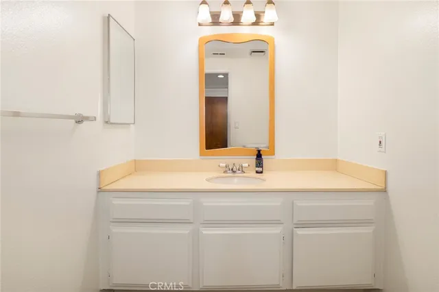 a view of a balcony with wooden floor and stairs