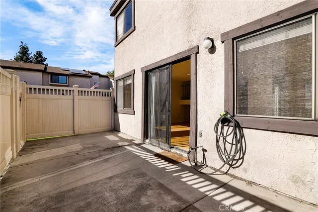 an aerial view of a houses with yard