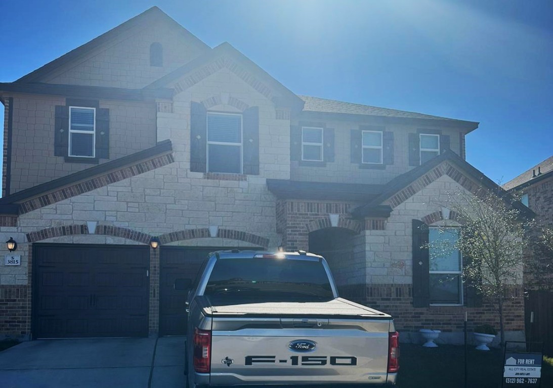 a car parked in front of a house