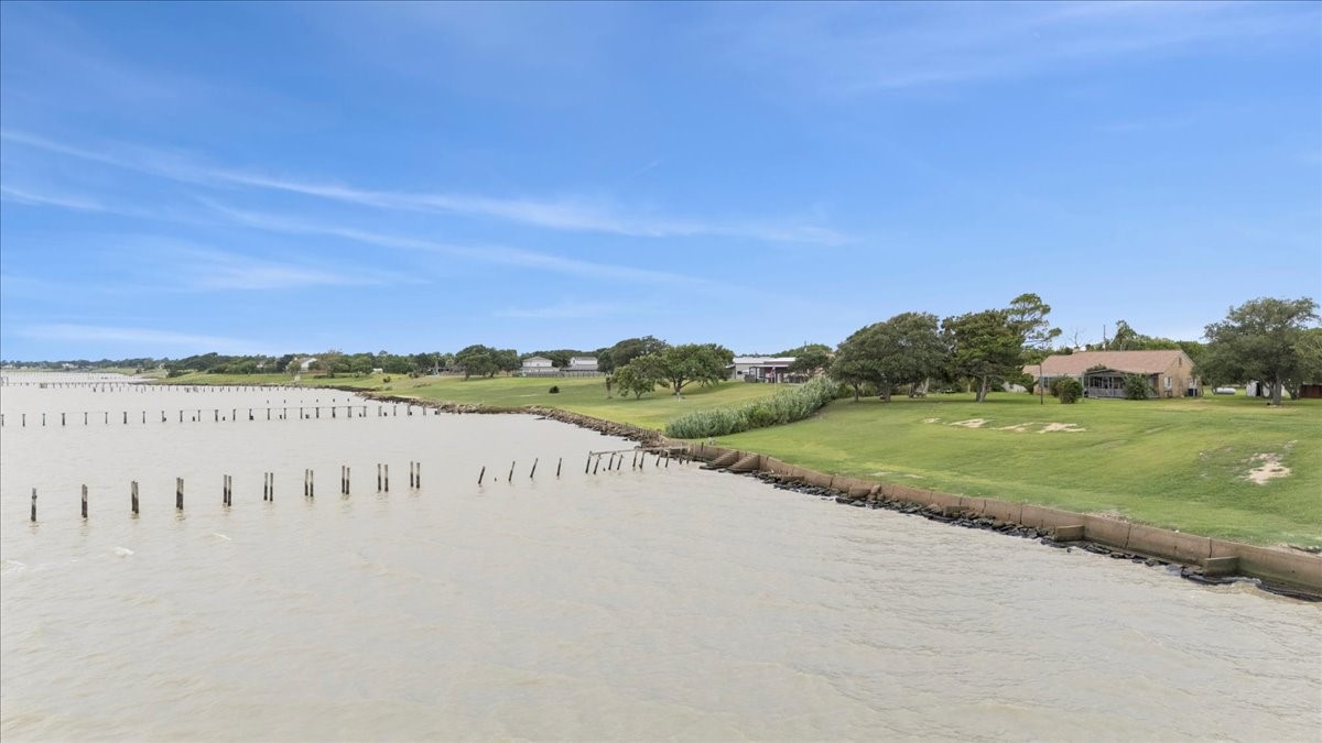 11910 Cedar Gully Road Beach City, TX 77523 - Photo 13 of 50 a view of a river and mountains in the background