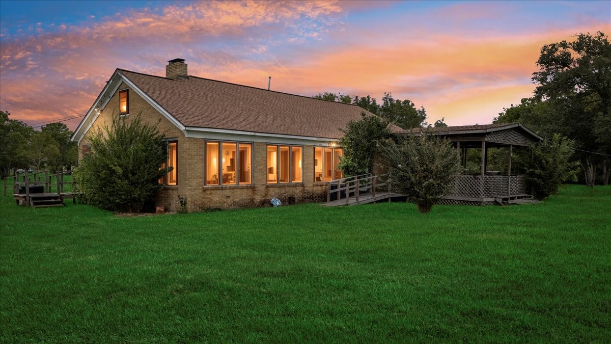11910 Cedar Gully Road Beach City, TX 77523 - Photo 2 of 50 a front view of house with yard and green space