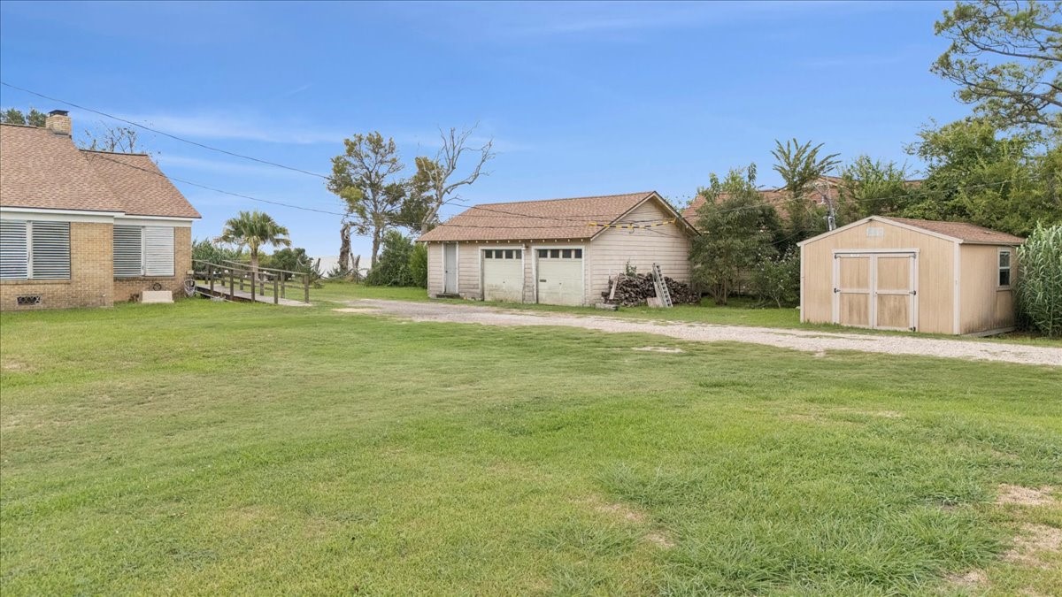 11910 Cedar Gully Road Beach City, TX 77523 - Photo 47 of 50 a house with garden view