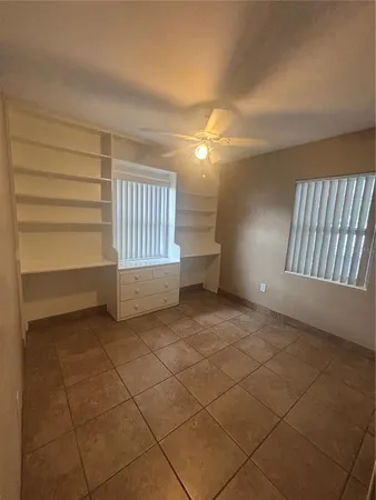 a bathroom with a sink toilet and a mirror