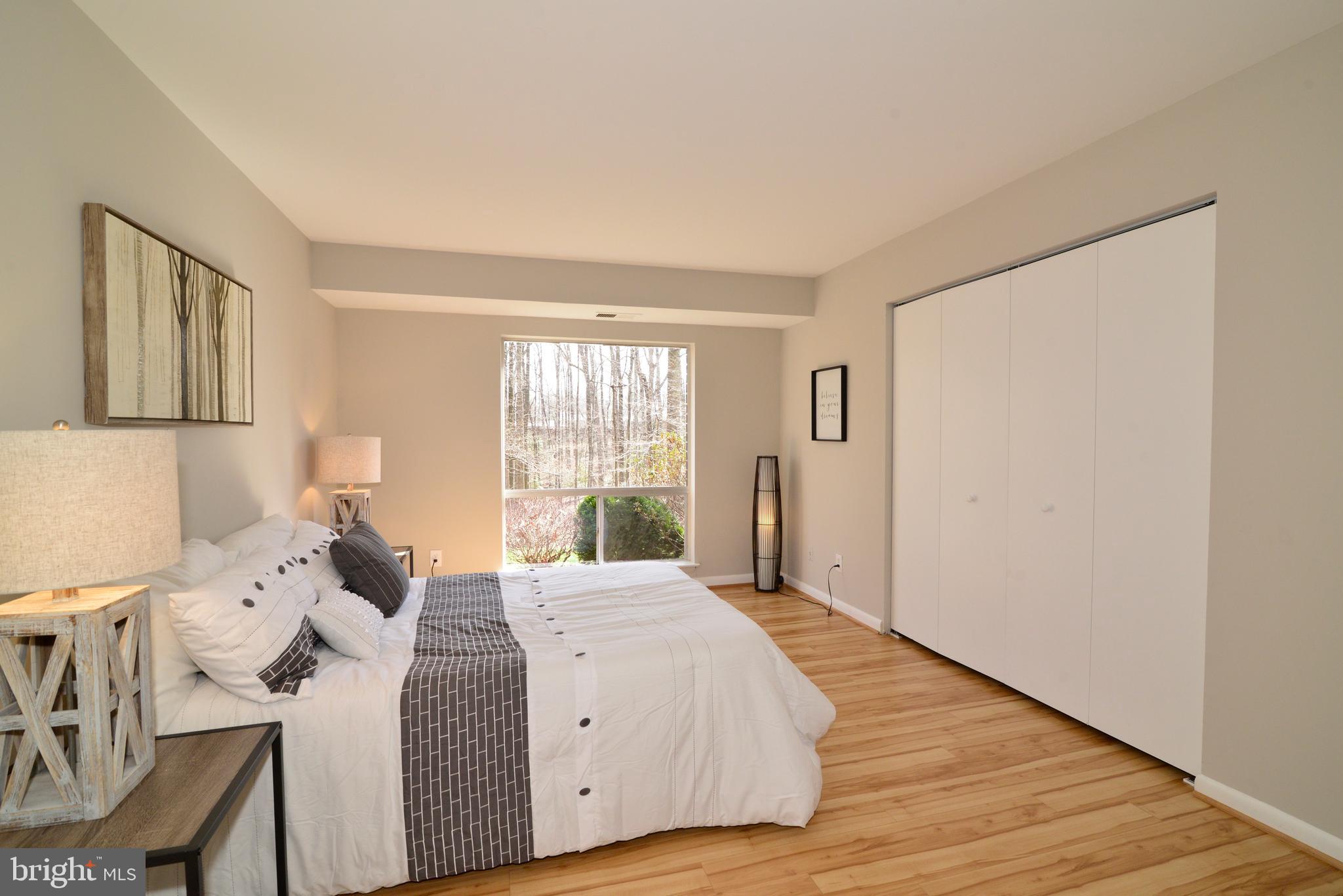 11623 Vantage Hill Road, Unit 1A Reston, VA 20190 - Photo 13 of 21 Master Bedroom: Closet with Custom Built-Ins.
