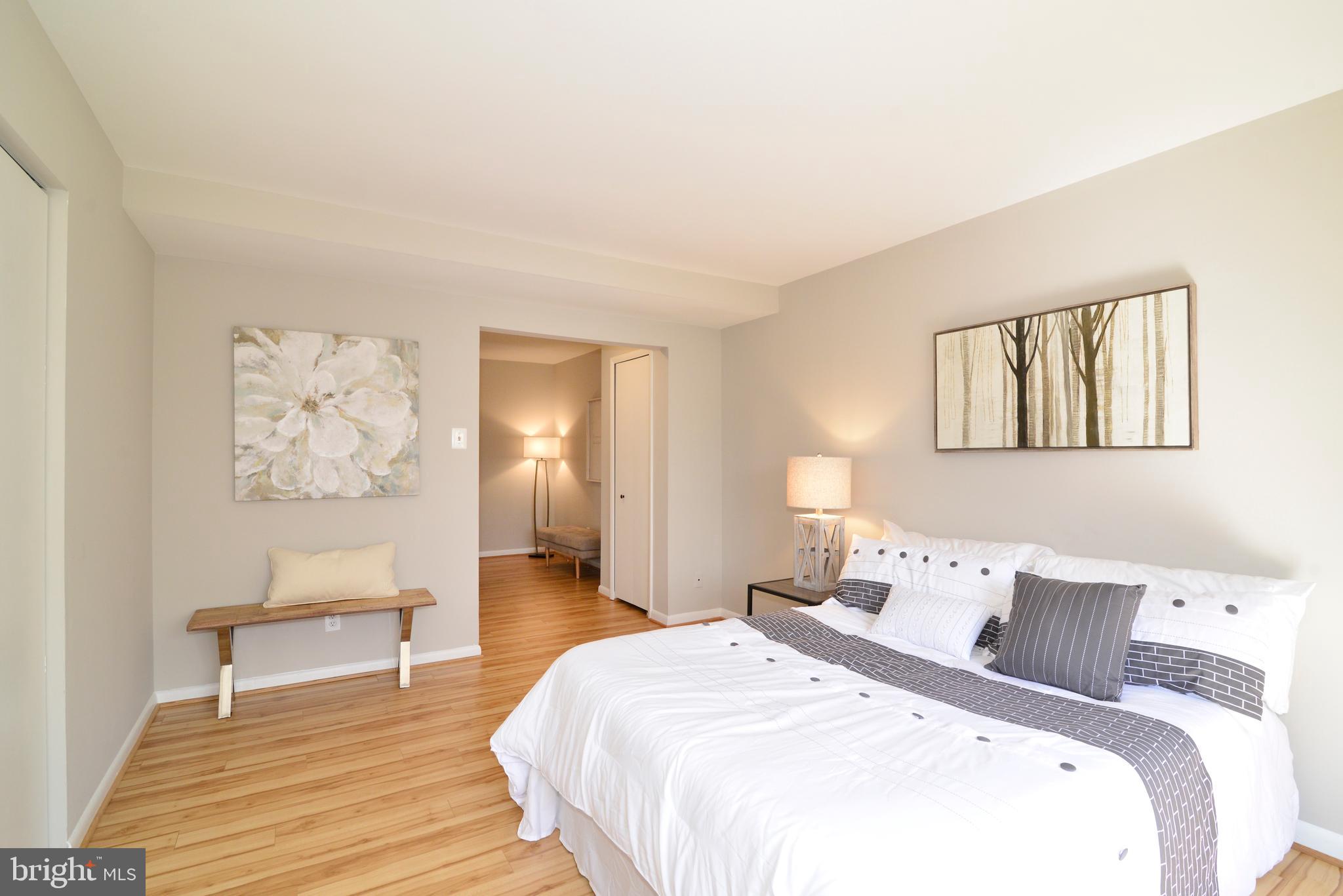11623 Vantage Hill Road, Unit 1A Reston, VA 20190 - Photo 15 of 21 Master Bedroom with View of Sitting Room.