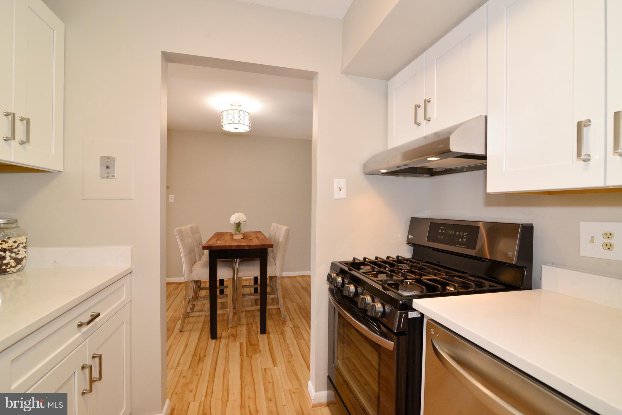 11623 Vantage Hill Road, Unit 1A Reston, VA 20190 - Photo 5 of 21 Remodeled Kitchen: Soft Close Cabinetry.