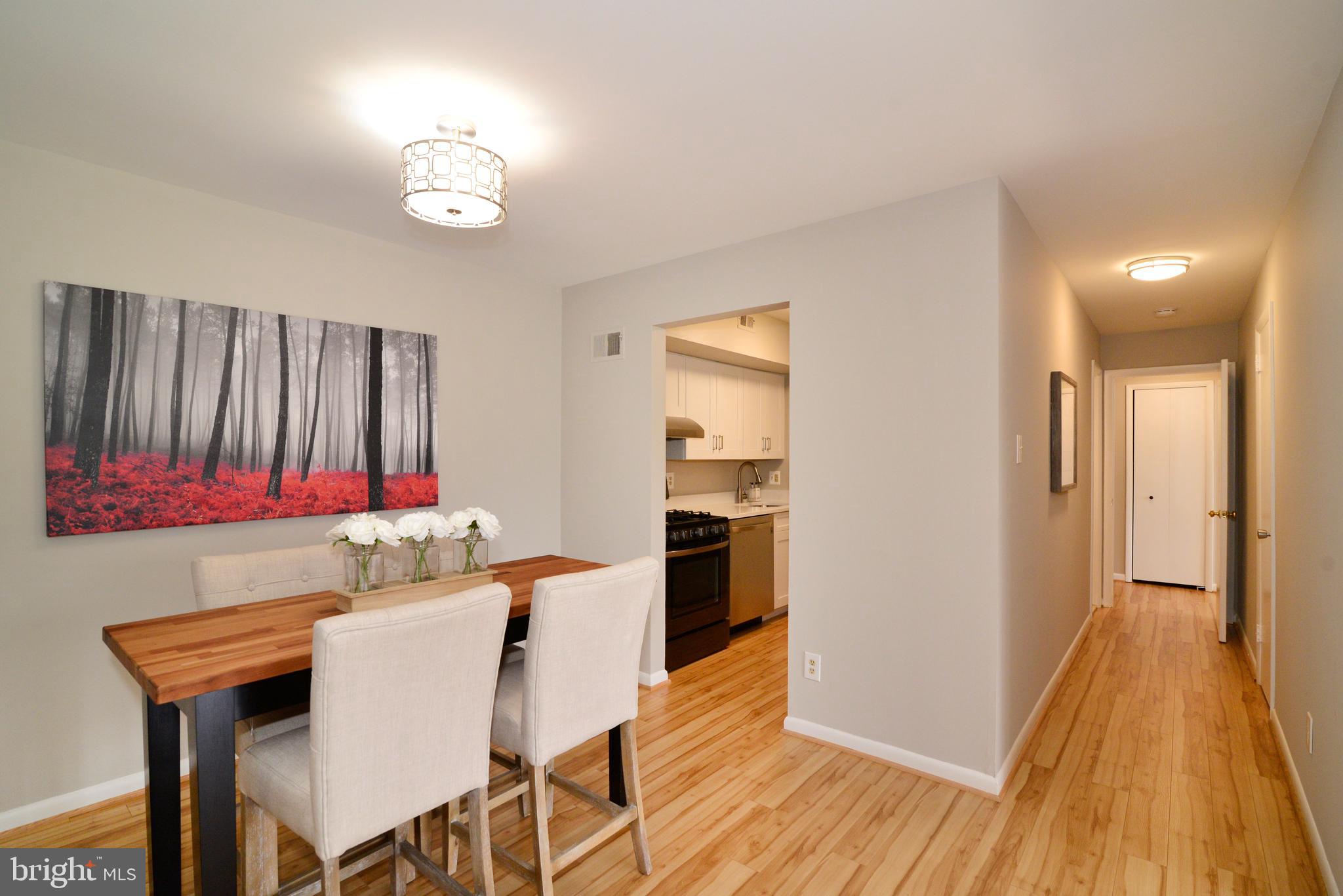11623 Vantage Hill Road, Unit 1A Reston, VA 20190 - Photo 6 of 21 Dining Room with New Light Fixture.
