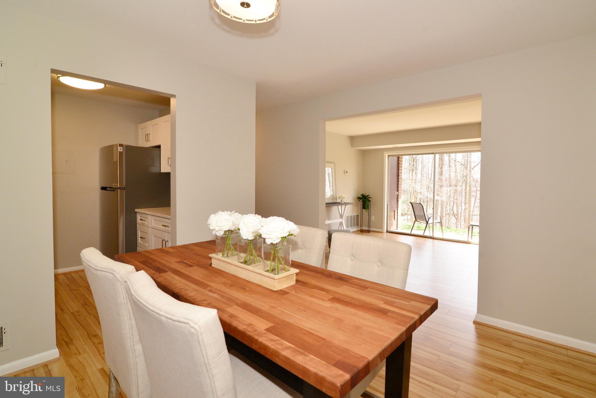11623 Vantage Hill Road, Unit 1A Reston, VA 20190 - Photo 9 of 21 Dining Room with View to Living Room.