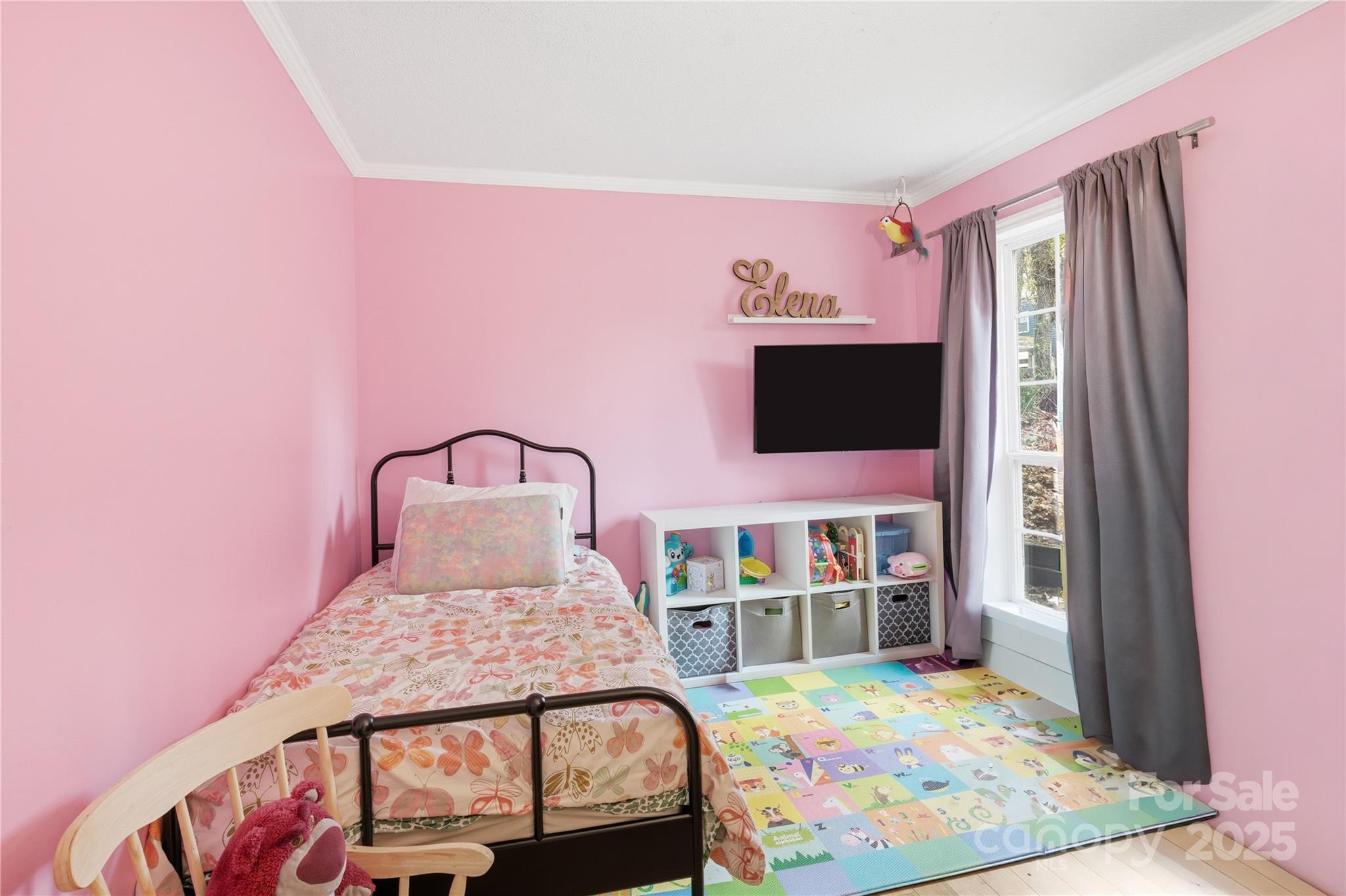 27071 Catamaran Drive Tega Cay, SC 29708 - Photo 16 of 30 a bedroom with a bed and flat screen tv