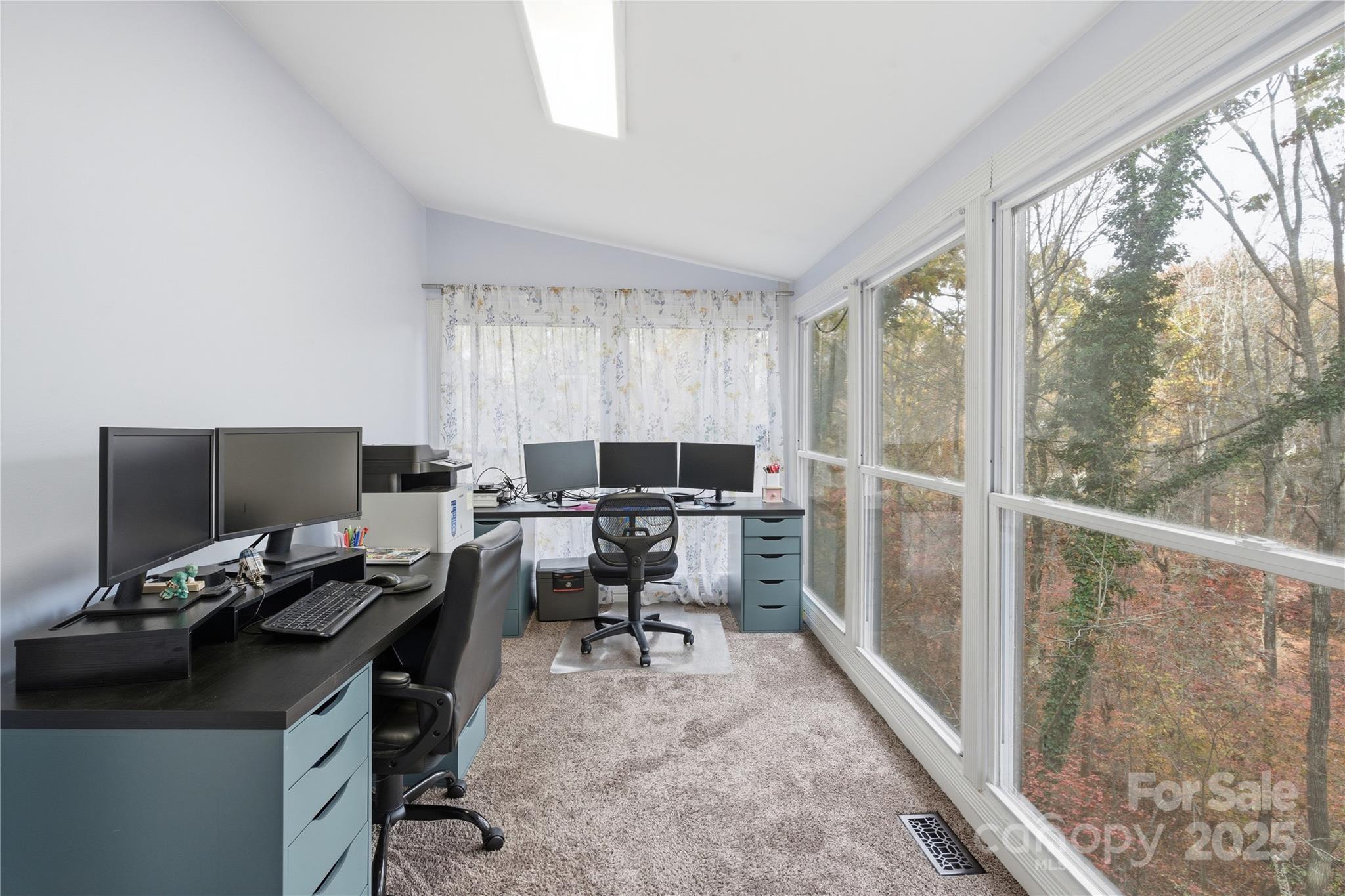27071 Catamaran Drive Tega Cay, SC 29708 - Photo 18 of 30 a workspace with furniture and a large window