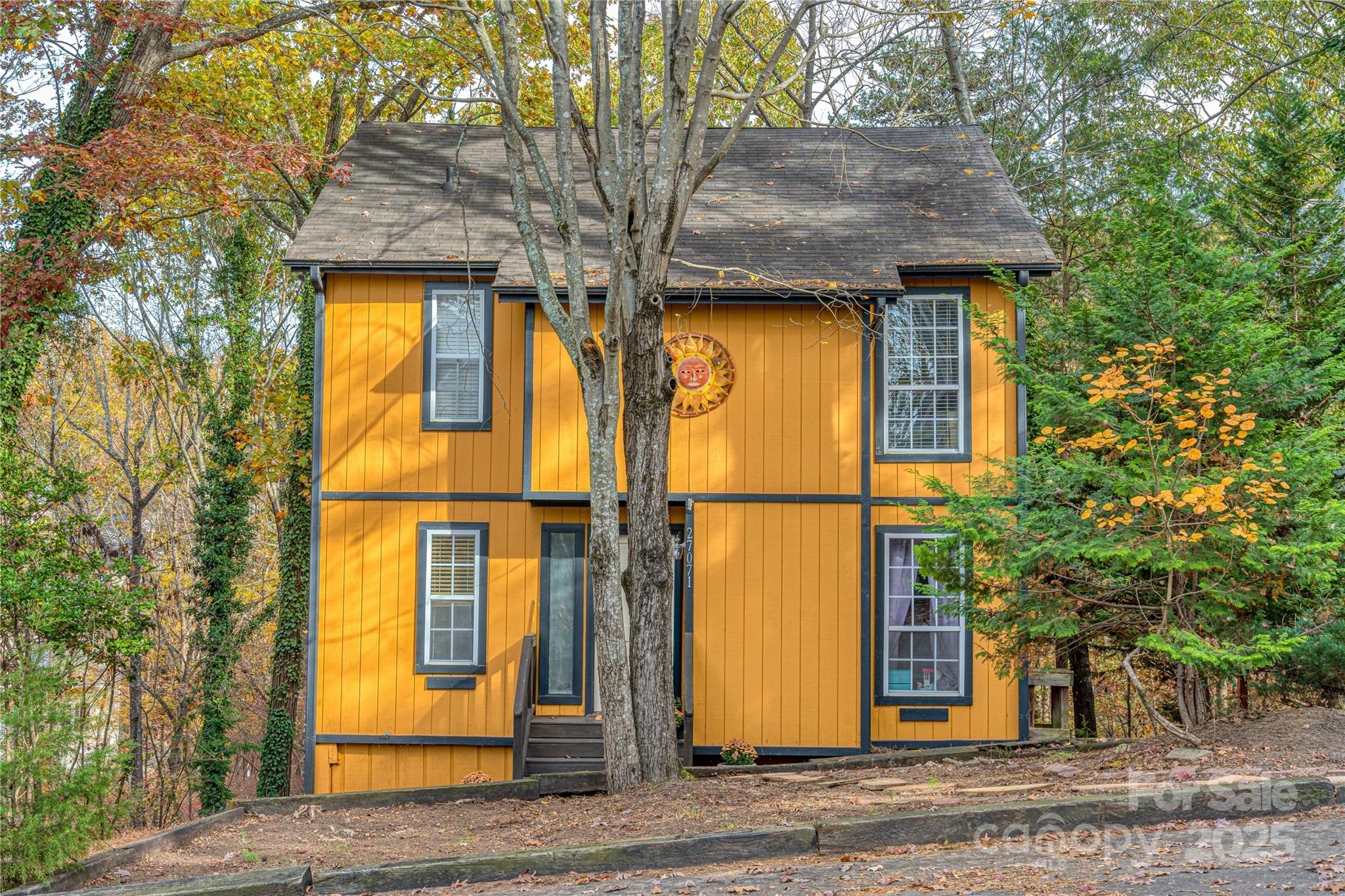 27071 Catamaran Drive Tega Cay, SC 29708 - Photo 2 of 30 a view of a house with a tree