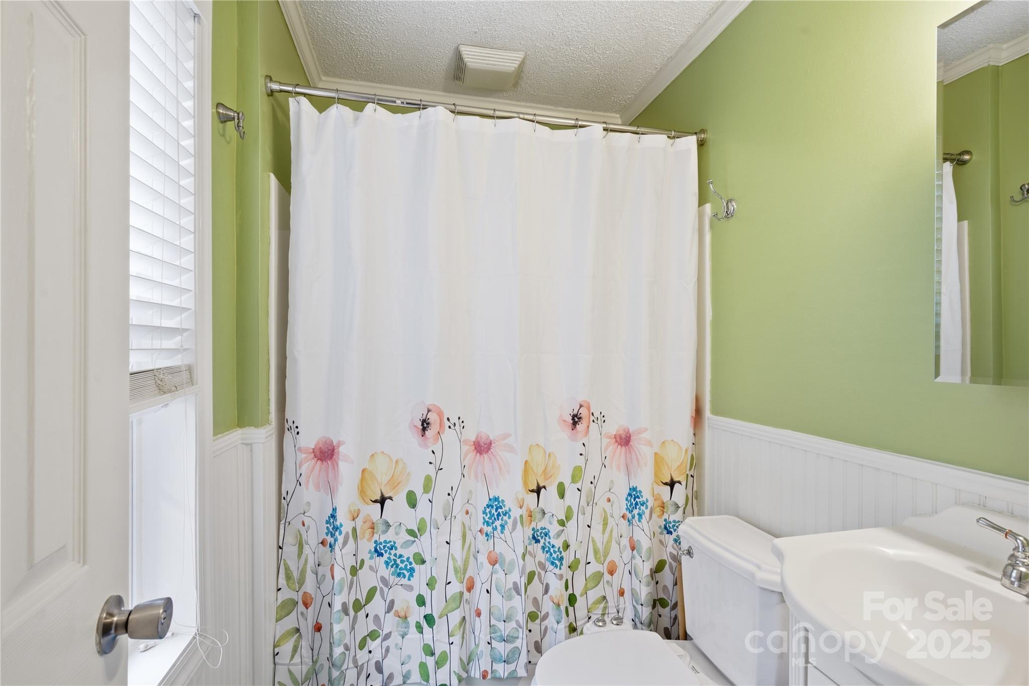27071 Catamaran Drive Tega Cay, SC 29708 - Photo 25 of 30 a bathroom with a sink toilet and shower