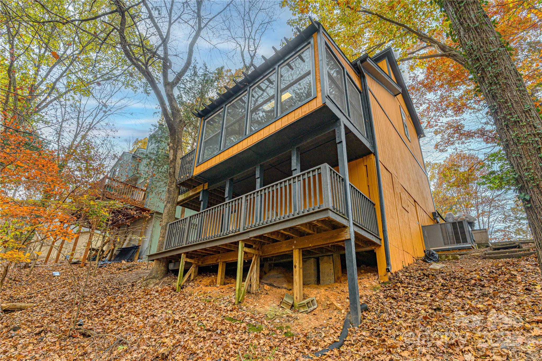 27071 Catamaran Drive Tega Cay, SC 29708 - Photo 27 of 30 a house with trees in front of it