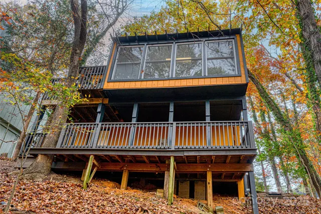 a view of an outdoor sitting area with brick walls