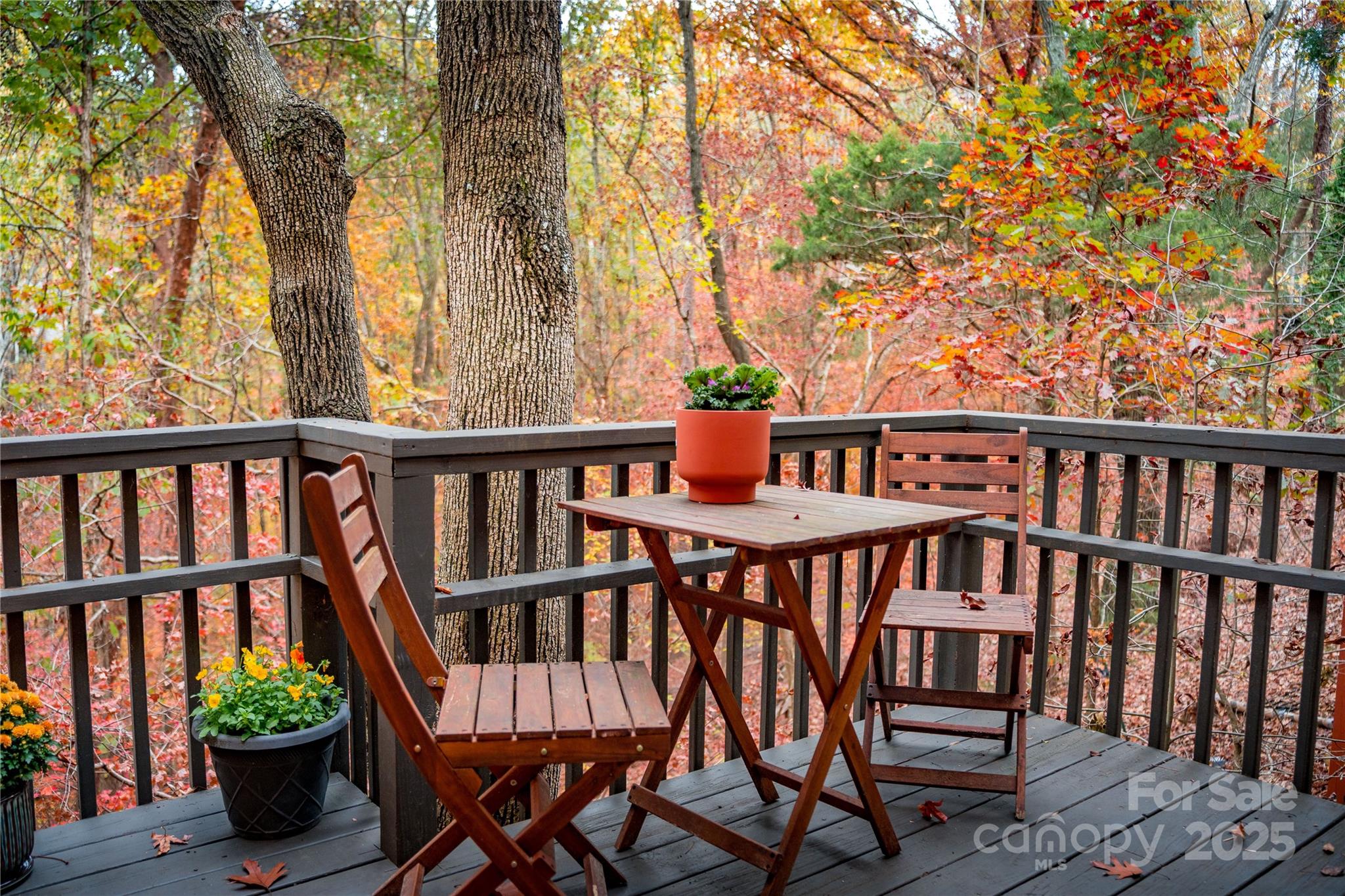 27071 Catamaran Drive Tega Cay, SC 29708 - Photo 30 of 30 a view of a wooden chairs and bench on the deck