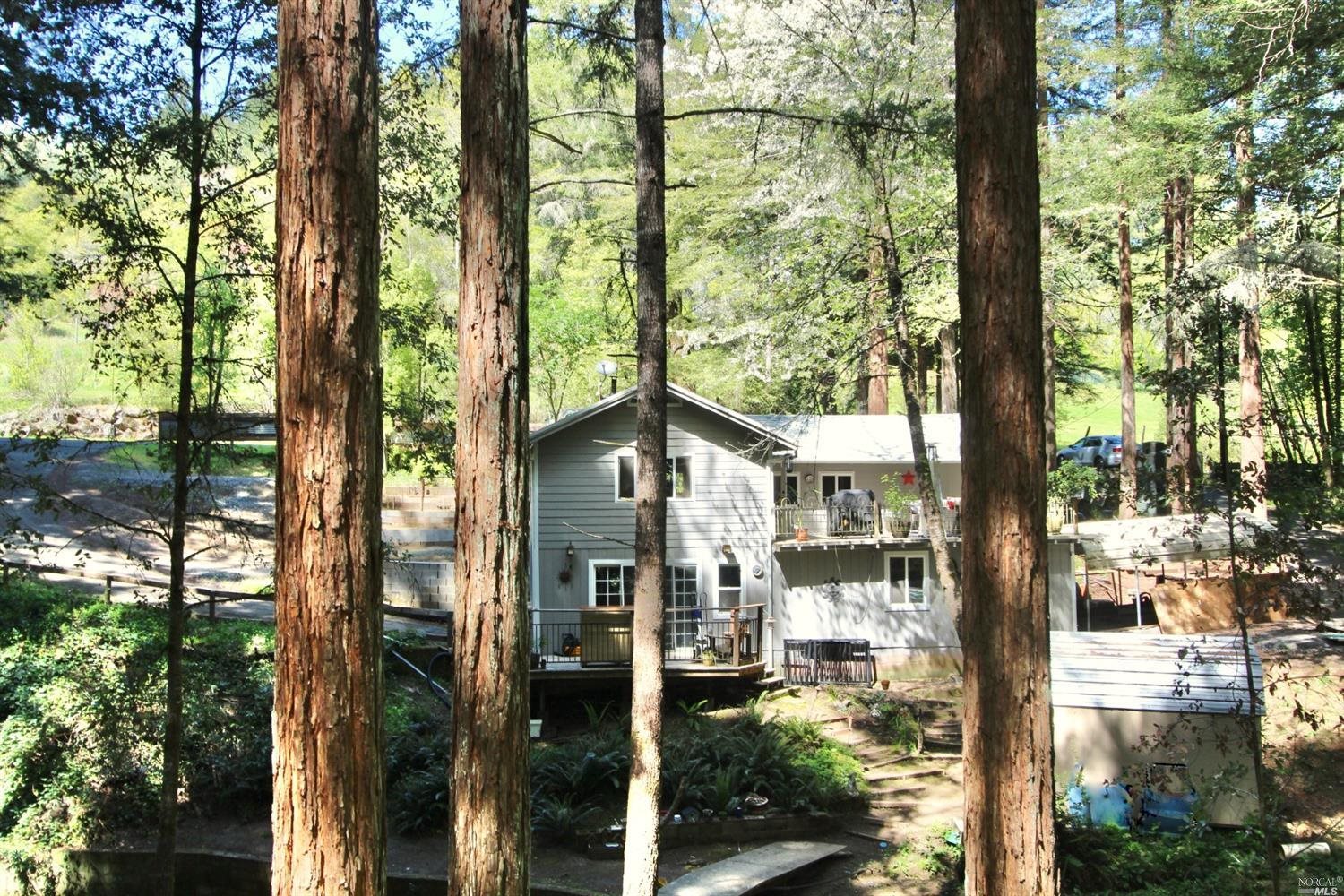 12891 Graton Road Sebastopol, CA 95472 - Photo 1 of 1 a front view of a house with a tree