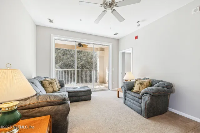 a living room with furniture and a couch