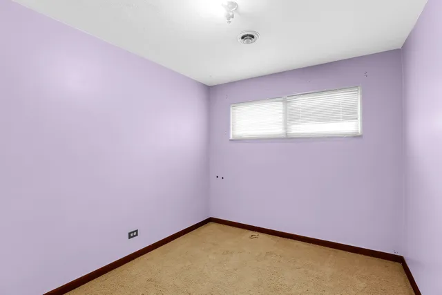 an empty room with closet