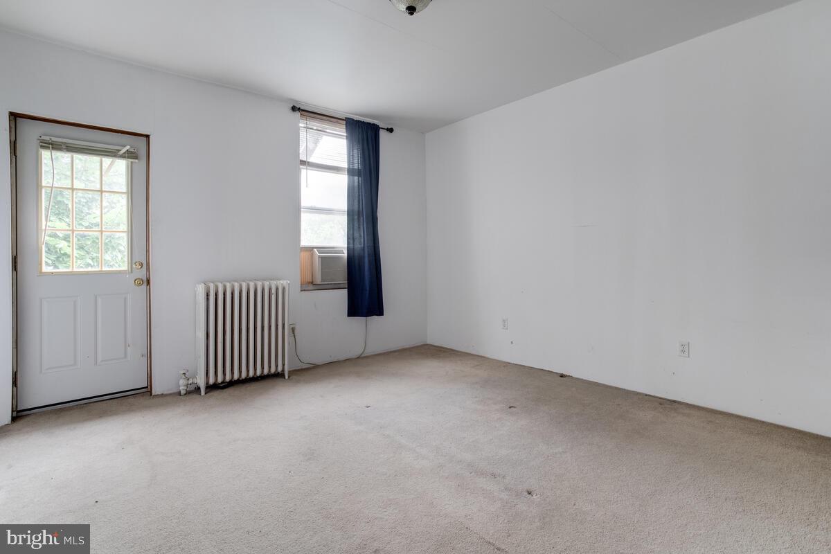 2739 North Calvert Street Baltimore, MD 21218 - Photo 29 of 61 Unit 2 Floor 2: Bedroom with access to fire escape