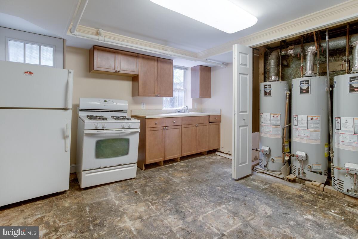 2739 North Calvert Street Baltimore, MD 21218 - Photo 54 of 61 Unit 4 Basement: Kitchen access to rear yard
