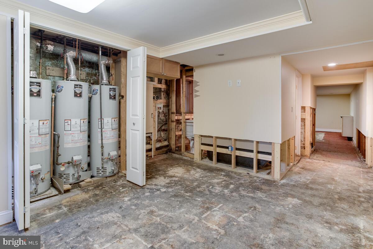 2739 North Calvert Street Baltimore, MD 21218 - Photo 55 of 61 Unit 4 Basement: 3 water heaters