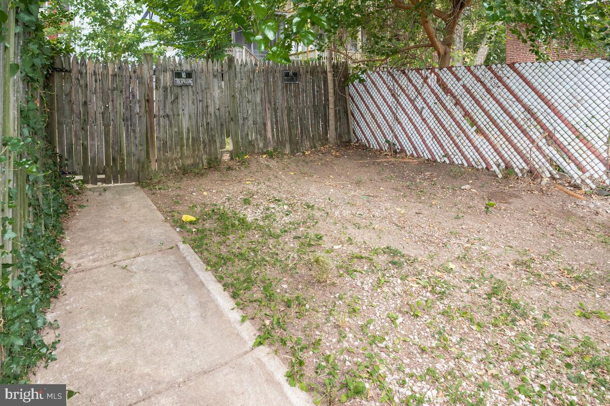 2739 North Calvert Street Baltimore, MD 21218 - Photo 61 of 61 Parking outside of fence