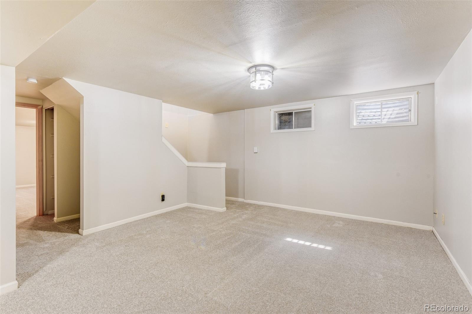 128 Olympus Circle Lone Tree, CO 80124 - Photo 8 of 35 a view of an empty room