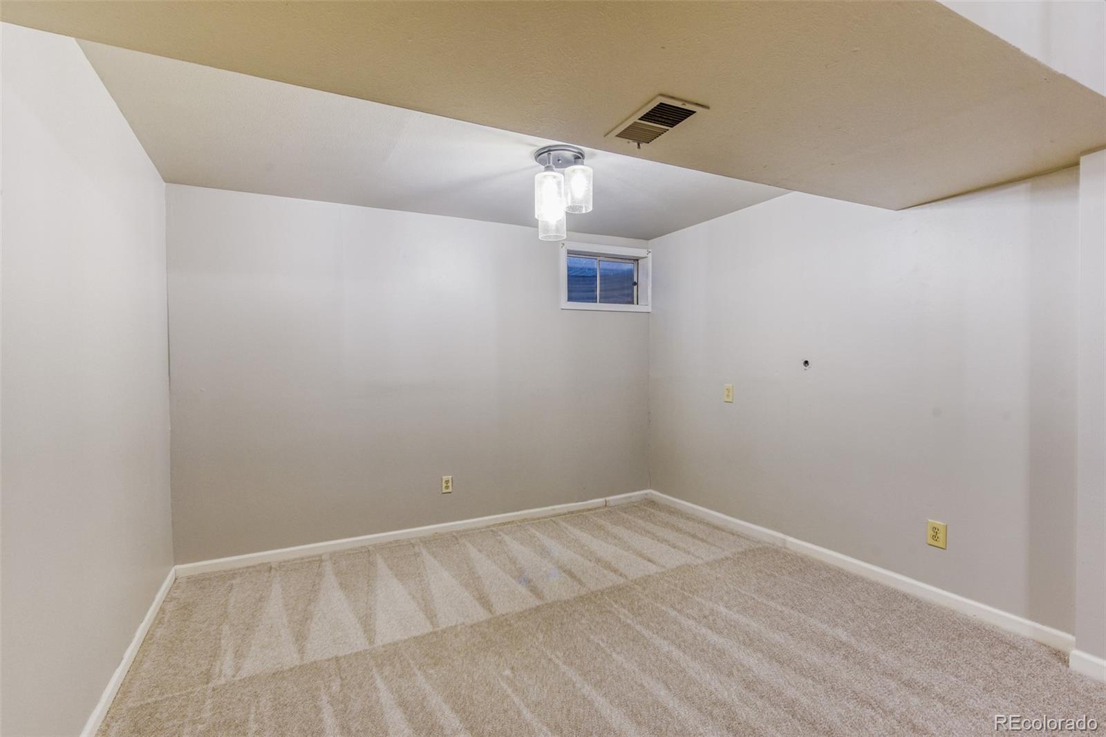 128 Olympus Circle Lone Tree, CO 80124 - Photo 10 of 35 a view of an empty room
