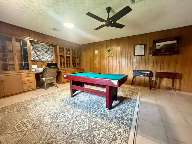 a bathroom with a toilet a sink and shower