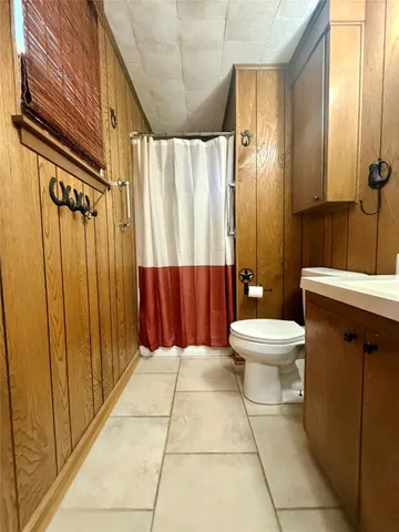 a view of outdoor space with playground and green space