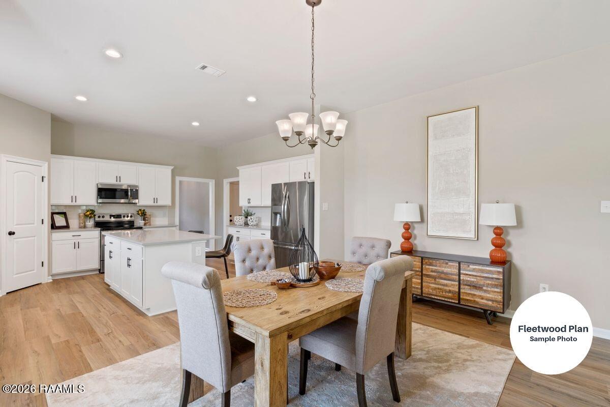 306 Mastermind Youngsville, LA 70592 - Photo 3 of 8 Living, Dining and Kitchen