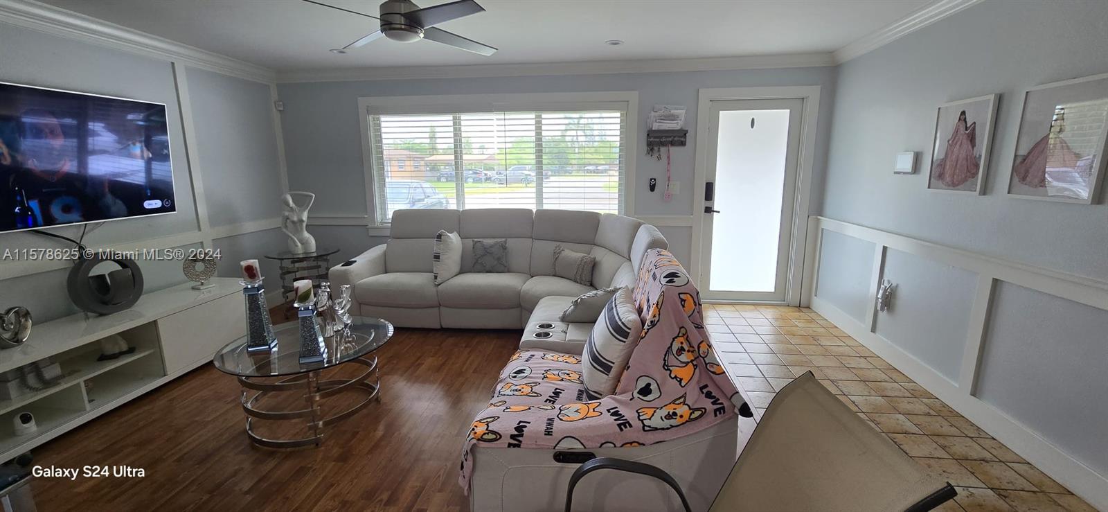 30018 Southwest 159th Drive Homestead, FL 33033 - Photo 11 of 27 a living room with furniture or couch and a flat screen tv