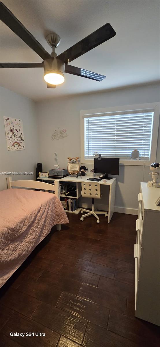 30018 Southwest 159th Drive Homestead, FL 33033 - Photo 21 of 27 a bed room with a bed and furniture