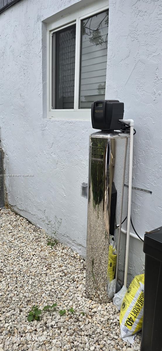 30018 Southwest 159th Drive Homestead, FL 33033 - Photo 24 of 27 a bathroom with a sink