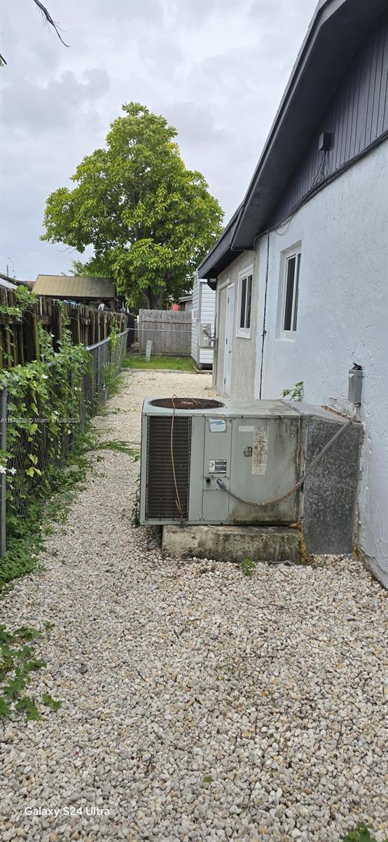 30018 Southwest 159th Drive Homestead, FL 33033 - Photo 25 of 27 a view of a house with a yard
