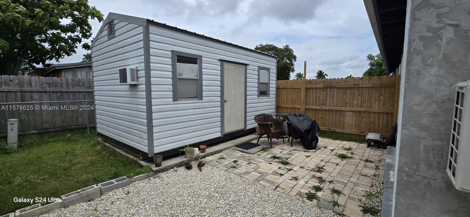 30018 Southwest 159th Drive Homestead, FL 33033 - Photo 27 of 27 a view of a back yard of the house
