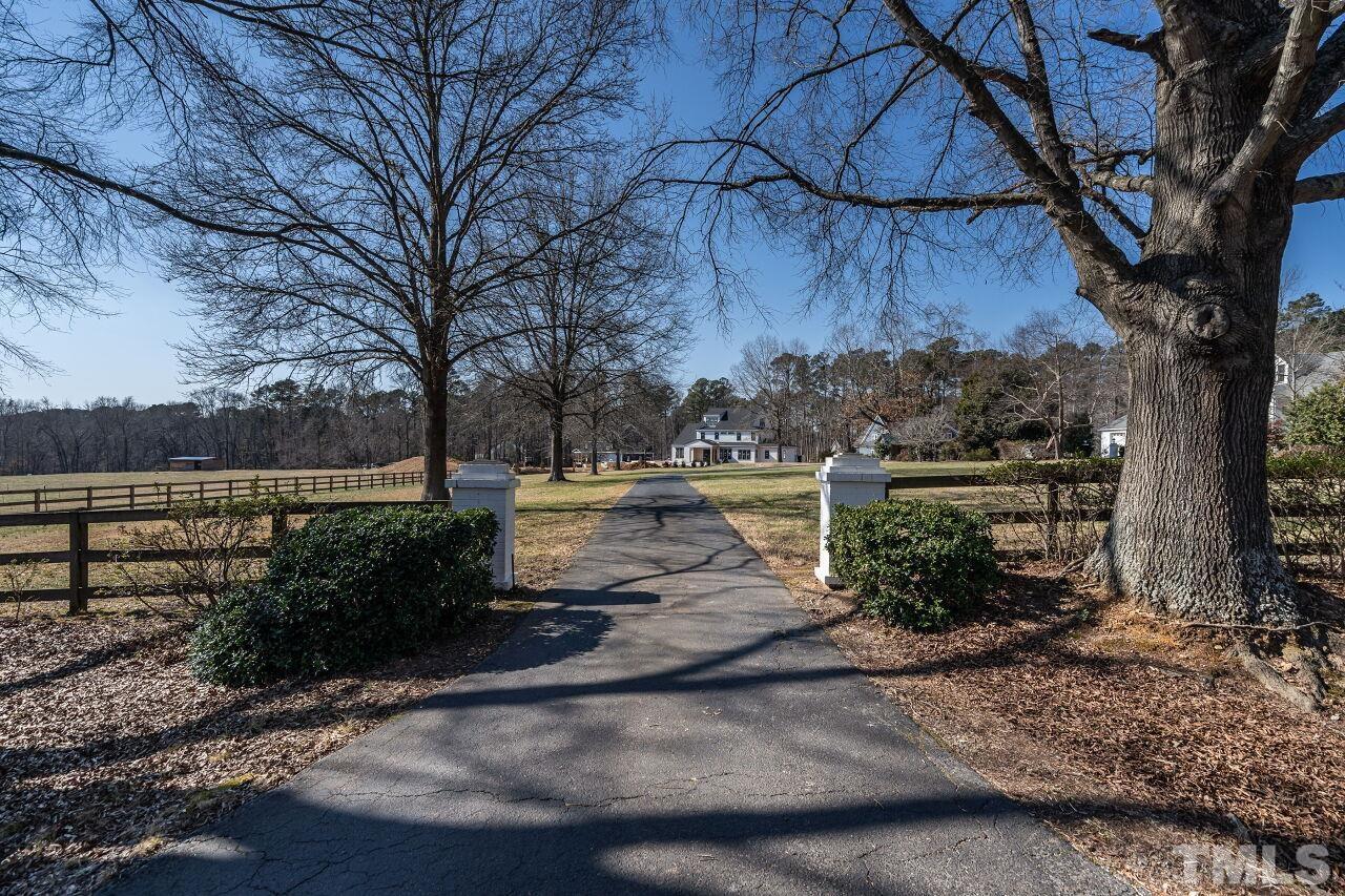 5212 Theys Road Raleigh, NC 27606 - Photo 12 of 55 a view of a yard and mountain view