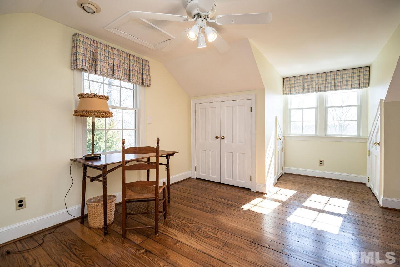 5212 Theys Road Raleigh, NC 27606 - Photo 33 of 55 a view of a livingroom with furniture window and wooden floor