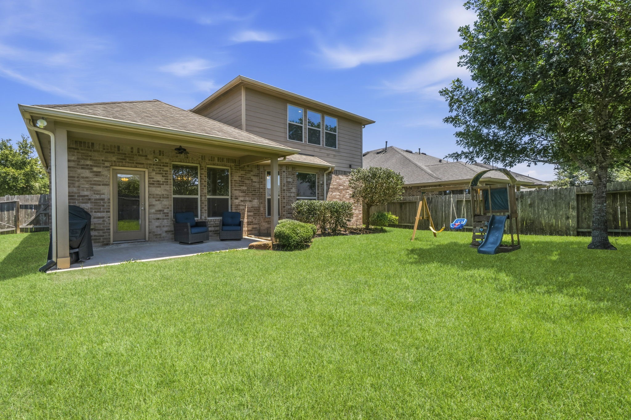 3900 Enchanted Timbers Lane Spring, TX 77386 - Photo 4 of 49 a front view of a house with garden