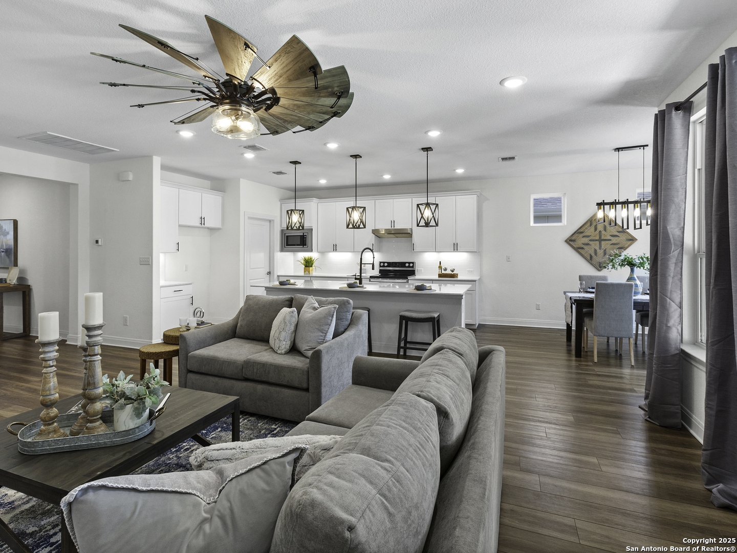 125 Slenderleaf Marble Falls, TX 78654 - Photo 16 of 49 a living room with furniture kitchen view and a wooden floor