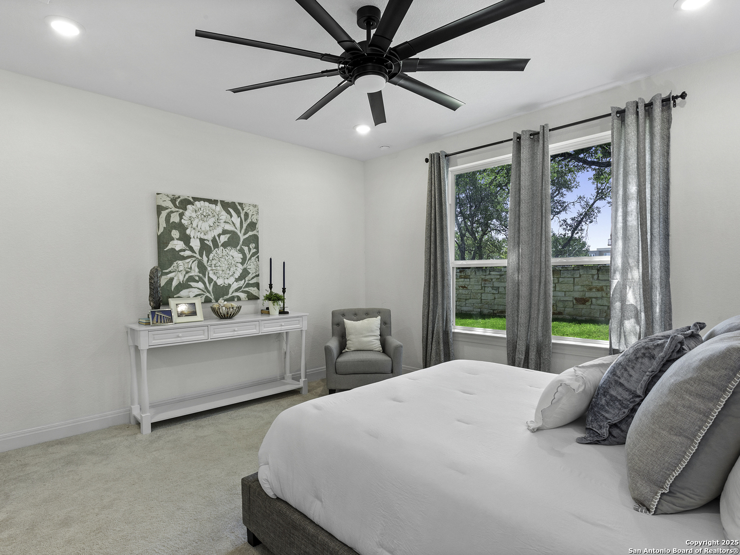 125 Slenderleaf Marble Falls, TX 78654 - Photo 19 of 49 a bedroom with a bed and a window