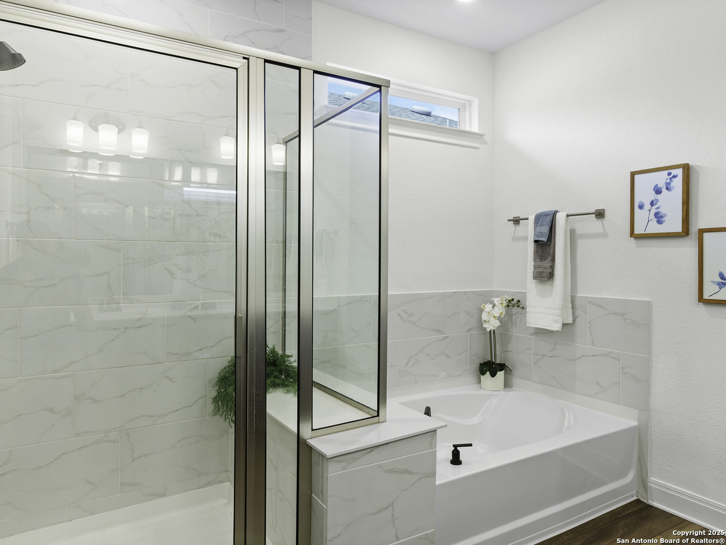 125 Slenderleaf Marble Falls, TX 78654 - Photo 21 of 49 a bathroom with a bathtub and a shower